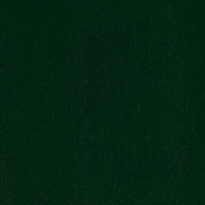 A close up image of a dark green background.