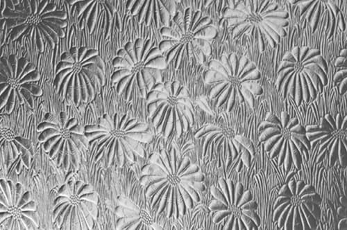 A black and white photo of a flower pattern.