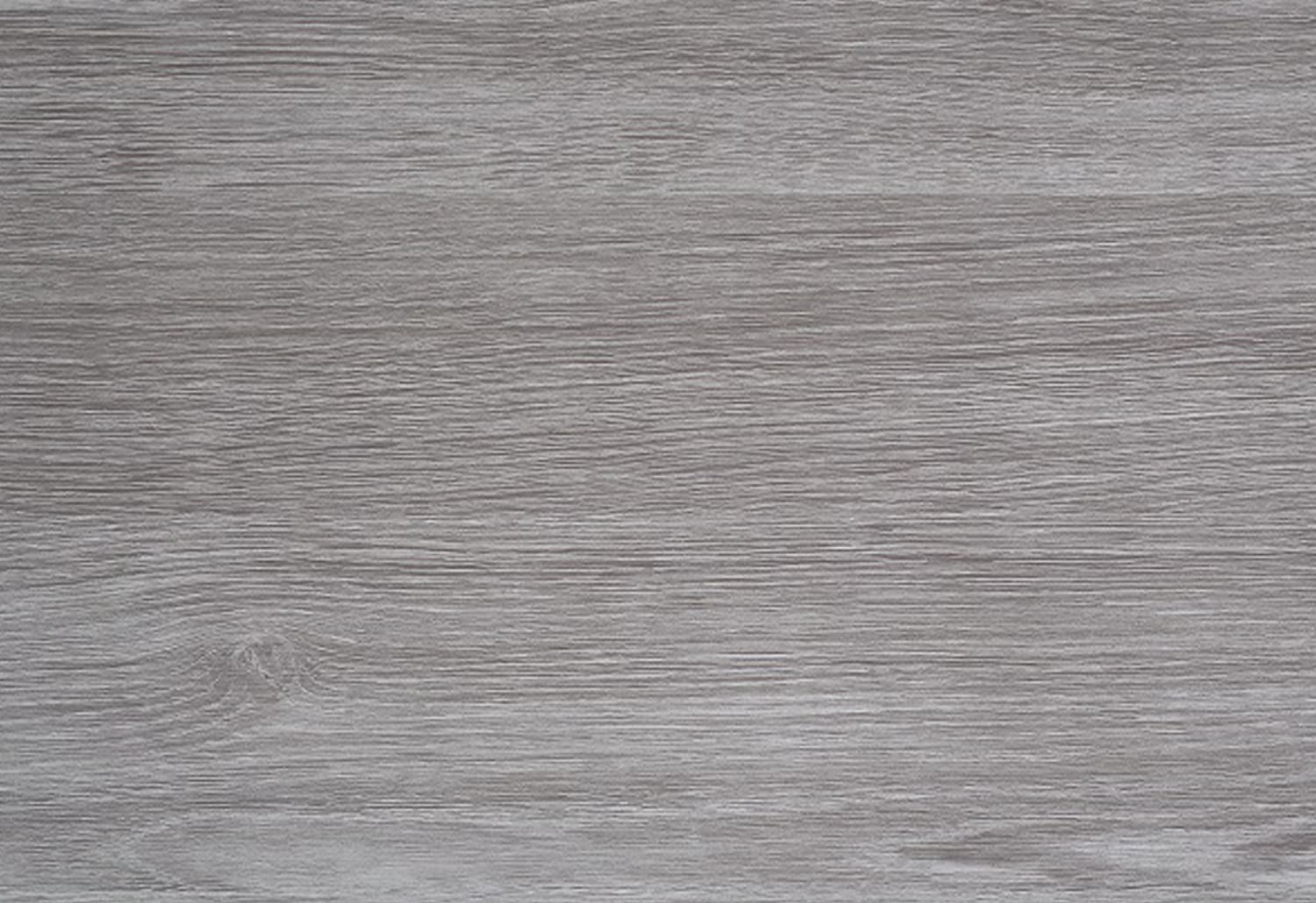 A close up image of a grey wood surface.