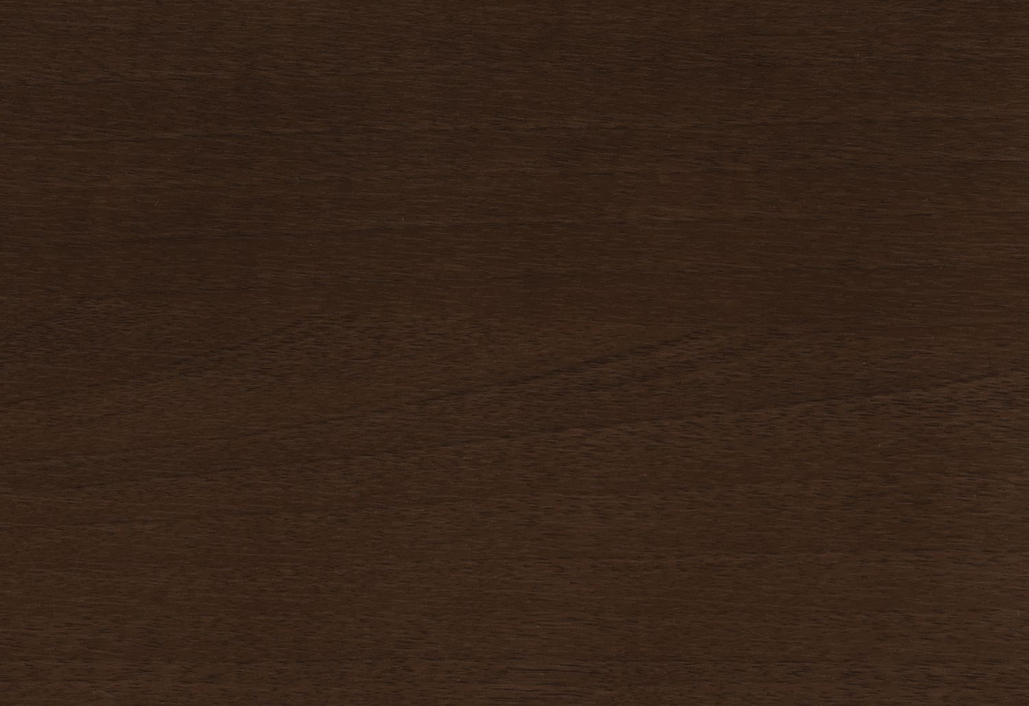 A close up image of a dark brown wooden surface.