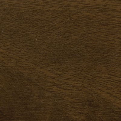 A close up image of a brown wood surface.